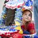 A youngster rides in a toy car on Monday, May 27. Daniel Brenner I AnnArbor.com
